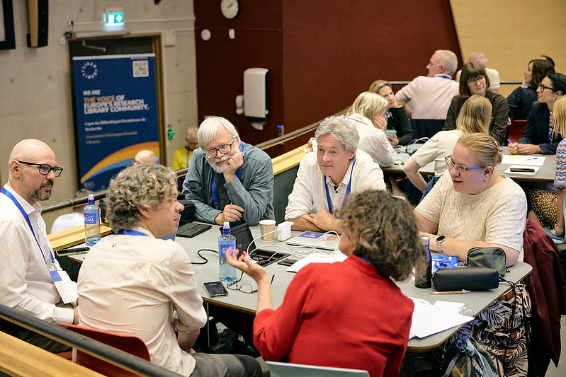 LIBER 2026 delegates, including EDCH Co-coordinator Pierre Mounier discussing in a roundtable.
